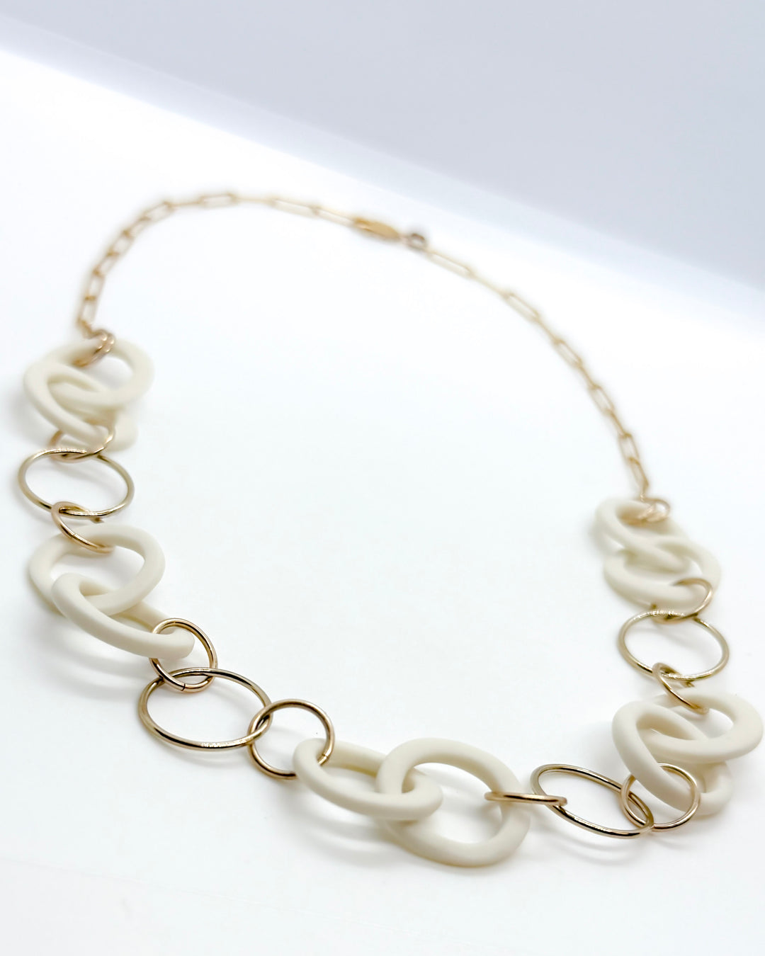 _the INTERLOCK LINKS necklace | natural porcelain + gold