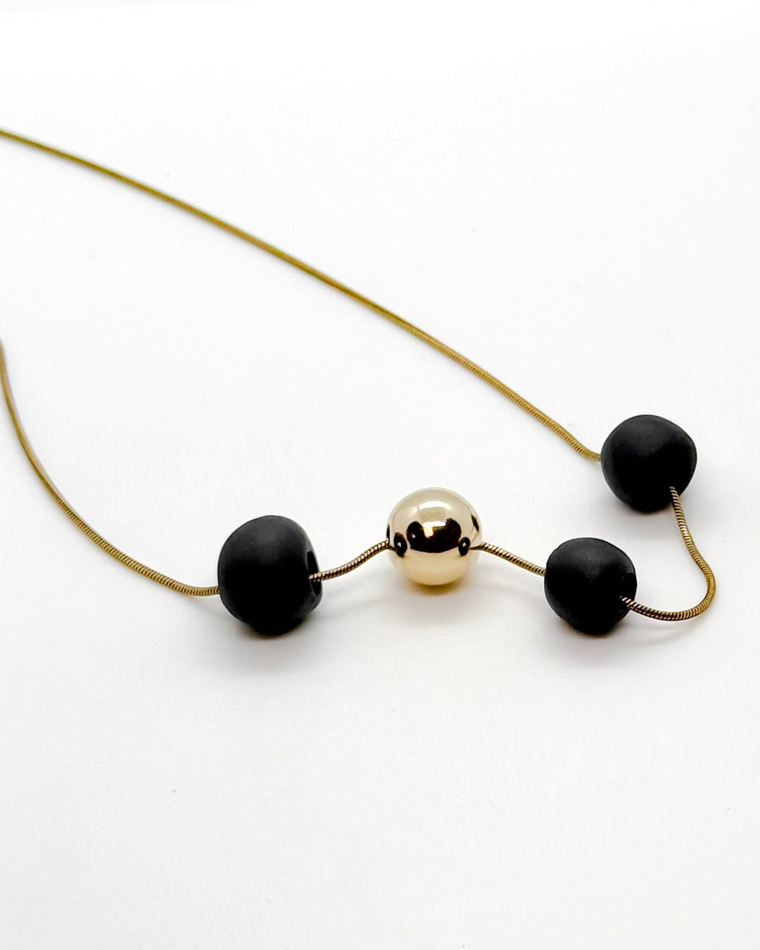 _the BEAD necklace | black porcelain + gold