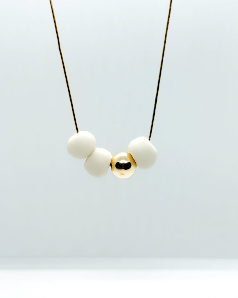 the BEAD necklace | porcelain + gold