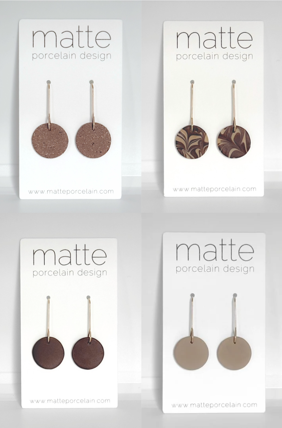 Four packages of Matte Porcelain Design products on a white background